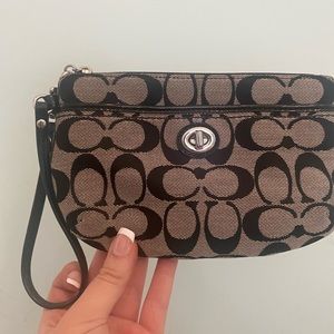 Black and grey coach wristlet